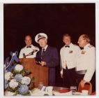 Walter Cronkite and three United States Coast Guard Auxiliary members